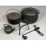Two cast iron lidded cauldrons / cooking pots, a cast iron kettle on stand and an Herbert and Sons