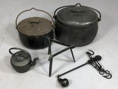 Two cast iron lidded cauldrons / cooking pots, a cast iron kettle on stand and an Herbert and Sons