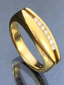 18ct Gold contemporary style ring set with a row of seven diamonds size 'O' and total weight 8.2g