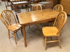 Pine kitchen table with four wheelback chairs, table approx. 120cm x 80cm