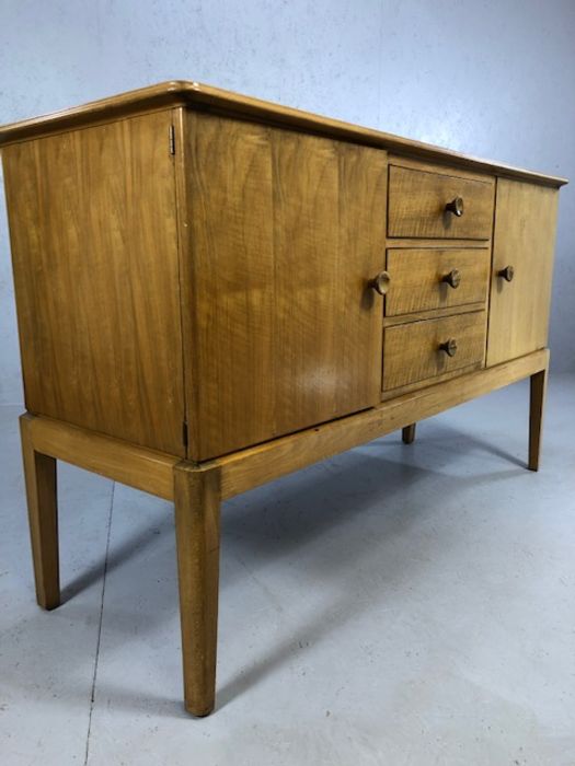 Mid Century walnut sideboard by GORDON RUSSELL of Broadway, with three drawers flanked by cupboards, - Image 6 of 7