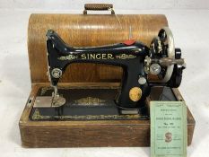 No.99 Singer sewing machine in original domed case, book, accessories, key, etc.