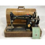 No.99 Singer sewing machine in original domed case, book, accessories, key, etc.