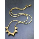 18ct Gold flat necklace with six articulated triangular pendants each set with three diamonds