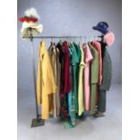 Collection of vintage clothing to include 1960s style dresses, various hats and a Burberrys rain