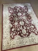 Chinese wool pink ground rug, approx 165cm x 235cm