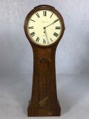 Oak Norfolk shaped wall clock, the 33cm enamelled dial inscribed J Giscard, Ely, the reverse stamped