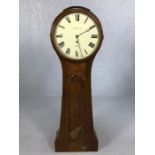 Oak Norfolk shaped wall clock, the 33cm enamelled dial inscribed J Giscard, Ely, the reverse stamped