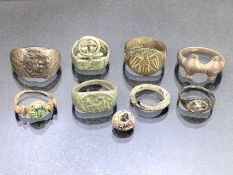 Collection of eight rings of varying ages, one bearing the imprint of a woman's head, possibly Julia