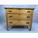 Vintage pine three drawer chest raised on legs and castors, with upstand, approx 104cm x 49cm x 94cm