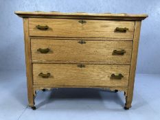 Vintage pine three drawer chest raised on legs and castors, with upstand, approx 104cm x 49cm x 94cm