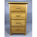 Modern oak chest of four drawers with glass top, approx 55cm x 43cm x 100cm tall