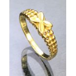 14ct Gold ring with flower design and pierced shoulders size 'L' and approx 1.9g