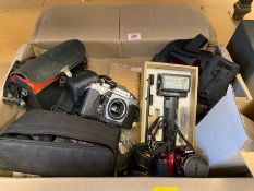 Collection of camera equipment to include Nikon camera body, Pentax, Praktika, plus lenses, filters,