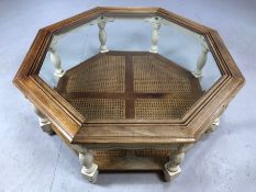 Octagonal wooden framed, glass topped coffee table with rattan lower shelf, approx 96cm x 96cm x