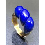 14ct Gold ring marked 585 and set with large Blue carved Lapis Lazuli size approx 'O'