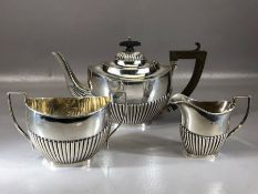 Silver hallmarked tea service consisting of a teapot (471g) sugar bowl (156g) & a milk jug (88g)
