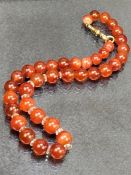 Carnelian/ Cornelian beaded necklace with a 15ct Gold clasp approx 37cm long