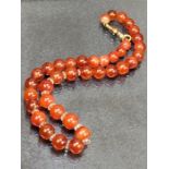 Carnelian/ Cornelian beaded necklace with a 15ct Gold clasp approx 37cm long