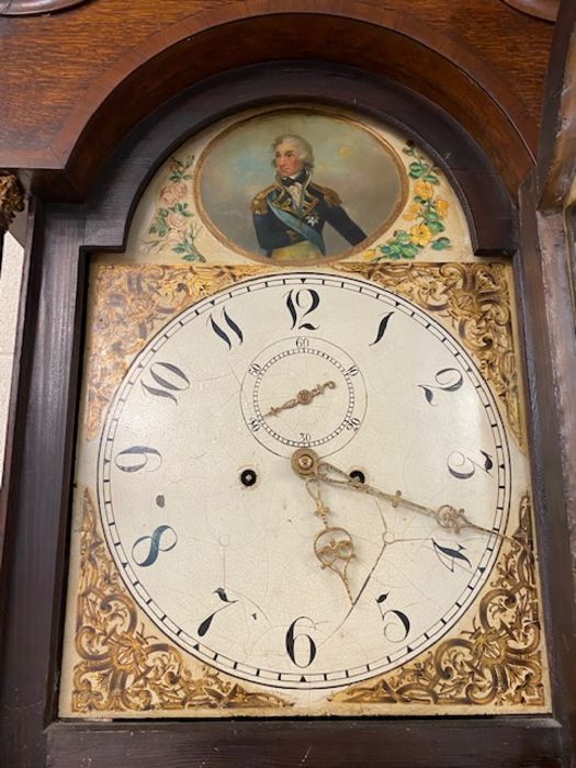 Longcase grandfather clock with painted face depicting Nelson, brass finials and column supports - Image 7 of 9