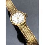 9ct Gold watch on 9ct Gold strap & clasp by SANFORD Bros with INCABLOC movement total weight