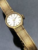 9ct Gold watch on 9ct Gold strap & clasp by SANFORD Bros with INCABLOC movement total weight