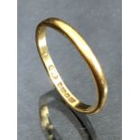 22ct Gold band approx 2.3g & size 'N' (slightly misshapen)