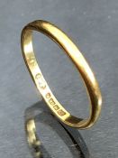 22ct Gold band approx 2.3g & size 'N' (slightly misshapen)