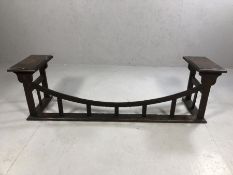 Wooden fire surround with small bench seats to ends, approx 148cm x 36cm x 41cm tall
