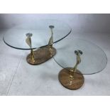 Modern glass oval coffee table on twisted gold coloured legs with marble plinth and matching
