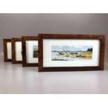 Four nicely framed prints of coastal scenes, each approx 19cm x 9cm