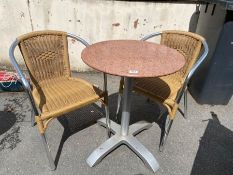 Marble topped garden bistro table, approx 60cm in diameter, and two garden chairs