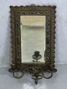Copper and brass ornate mirror frame with bevel edged mirror and three armed sconce, frame approx