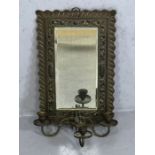 Copper and brass ornate mirror frame with bevel edged mirror and three armed sconce, frame approx