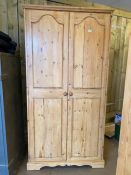 Pine two door wardrobe, approx 107cm x 62cm x 217cm tall