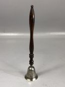 Silver candle snuffer on a turned wooden handle approx 21cm long Hallmarked for London maker W H &