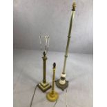Three lamp bases, two metal, one wood. The tallest of which is approx: 120cm