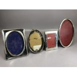 Good collection of four Silver coloured photo frames some continental silver