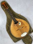 Vintage eight string mandolin, with inlaid detailing, marked Goldklang, with canvas carry case
