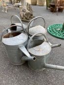Collection of four vintage watering cans