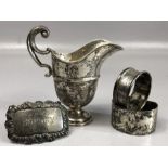 Collection of hallmarked silver items to include small silver jug two napkin rings and a Sherry