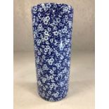 Blue and white ceramic umbrella stand in a floral design, stamp to base, approx 44cm in height