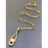 9ct Gold chain with 9ct pendant set with a single pearl approx 40cm long and 2.1g
