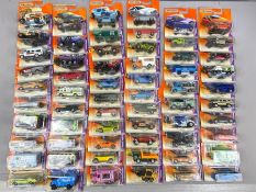Sixty two Matchbox model diecast vehicles, all in sealed orange blister packs