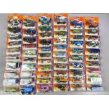 Sixty two Matchbox model diecast vehicles, all in sealed orange blister packs