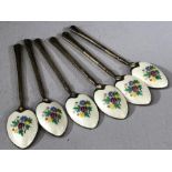 Set of six Silver hallmarked spoons each with colourful enamel backs with flowers on a white ground.