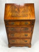 Small bureau with four drawers under a fall front with leather inlay and internal pigeon holes,