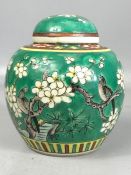 19th/ 20thC Chinese porcelain green enamelled ginger jar and cover, decorated with birds and blossom