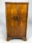 Two door cabinet containing six shelves, approx 42cm x 37cm x 80cm tall