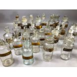 Collection of 19th Century clear glass chemist apothecary bottles with stoppers, various gilt